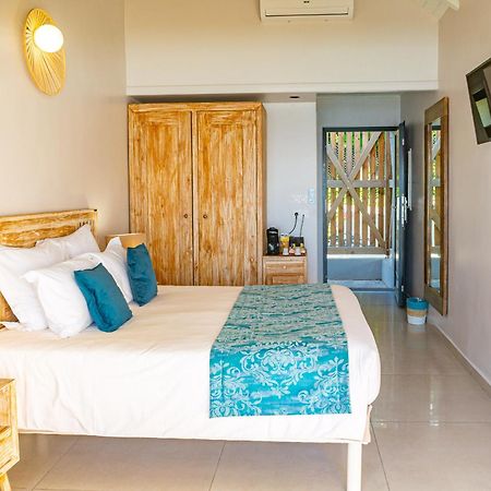 Les Galets Rouges Lodges & Spa Bouillante Exterior foto